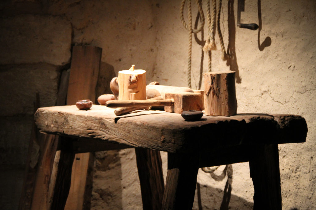 Carpenter's tools on a wooden workbench